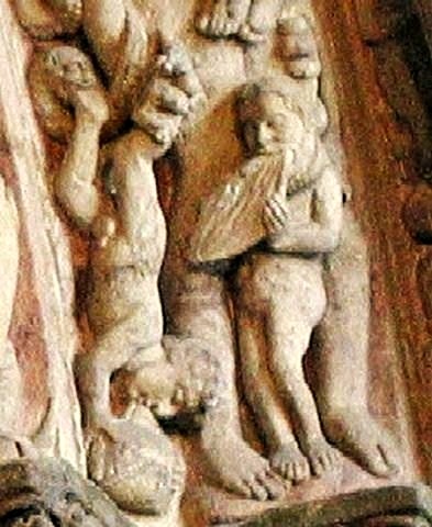 The glutton of the Pórtico da Gloria, clutching the empanada he is condemned never to swallow.